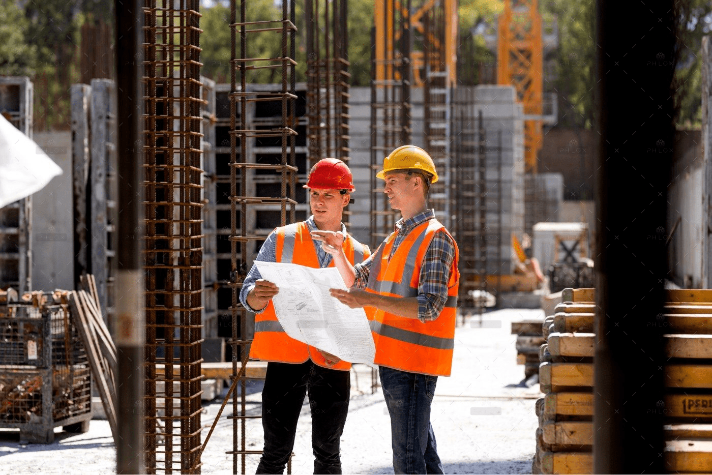 Gopher State Pallets MN two civil engineers work planning with pallets in the construction site